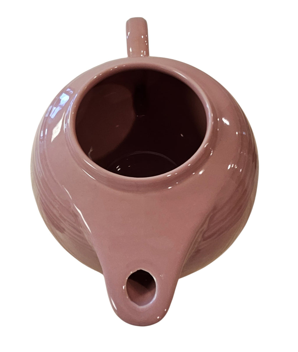 This is a Fiesta Fiestaware Five-cup 5-cup Ring Handled Tea Pot with Lid in Rose. lead-free, Post 1986, Retired Color Retired Shape
