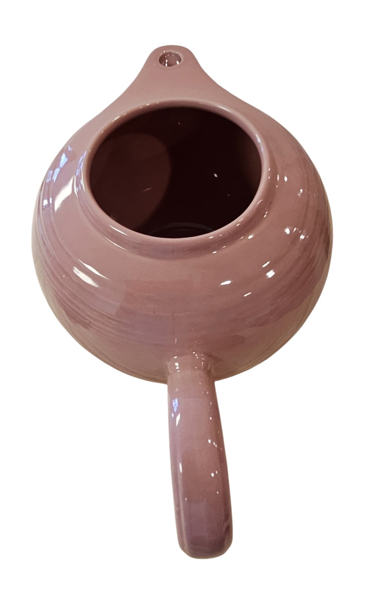 This is a Fiesta Fiestaware Five-cup 5-cup Ring Handled Tea Pot with Lid in Rose. lead-free, Post 1986, Retired Color Retired Shape

