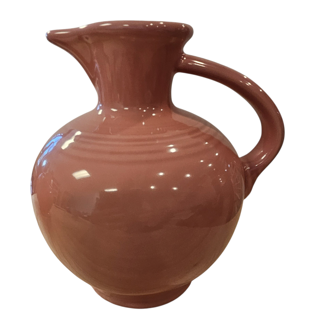 This is a Fiesta Fiestware 60 Ounce Carafe in Rose. Lead-free Post 1986 Retired color retired shape
