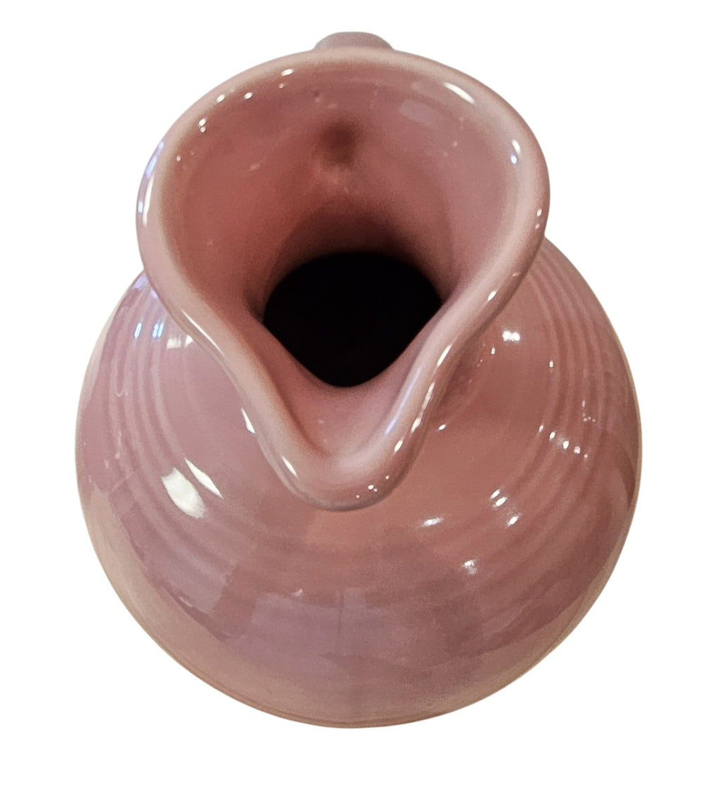 This is a Fiesta Fiestware 60 Ounce Carafe in Rose. Lead-free Post 1986 Retired color retired shape
