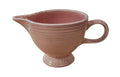 This is a Fiesta Fiestaware individual cream pitcher creamer in Rose. lead-free, Post 1986, Retired Color Retired Shape
