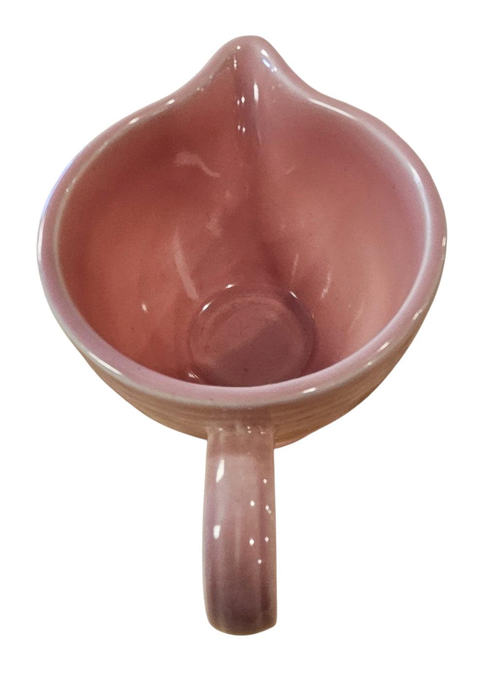 This is a Fiesta Fiestaware individual cream pitcher creamer in Rose. lead-free, Post 1986, Retired Color Retired Shape
