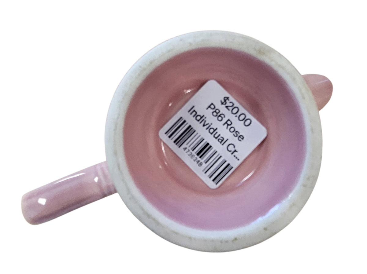 This is a Fiesta Fiestaware individual cream pitcher creamer in Rose. lead-free, Post 1986, Retired Color Retired Shape

