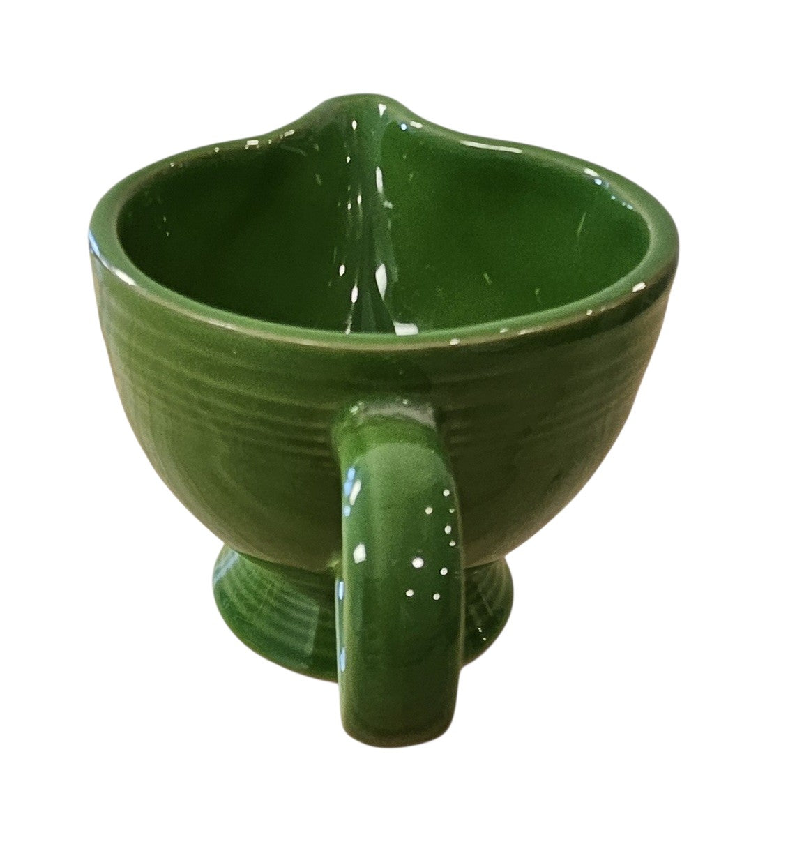 This is a Fiesta Fiestaware individual cream pitcher creamer in Shamrock. lead-free, Post 1986, Retired Color Retired Shape
