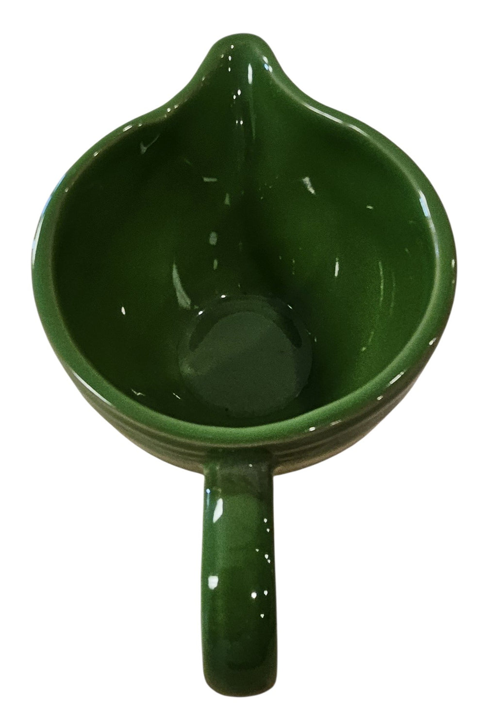 This is a Fiesta Fiestaware individual cream pitcher creamer in Shamrock. lead-free, Post 1986, Retired Color Retired Shape
