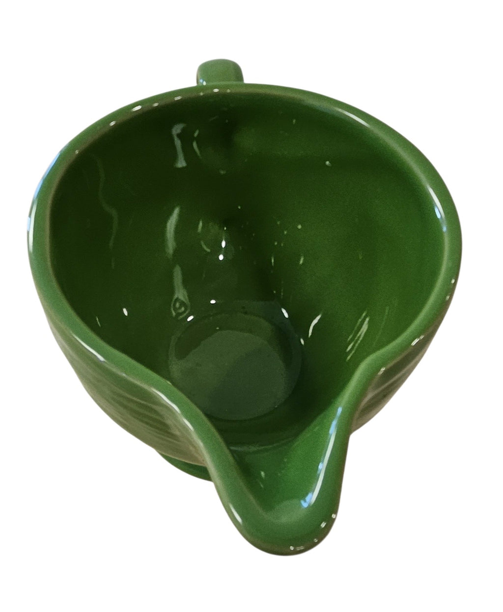 This is a Fiesta Fiestaware individual cream pitcher creamer in Shamrock. lead-free, Post 1986, Retired Color Retired Shape
