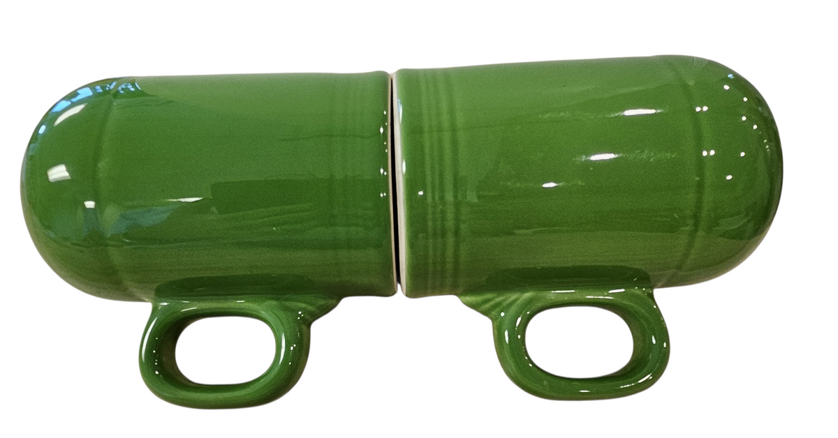 This is a Fiesta Fiestaware set of Range top Rangetop Salt and Pepper Shakers in shamrock. Post 1986 Retired Color Retired Shape Stove top Lead Free
