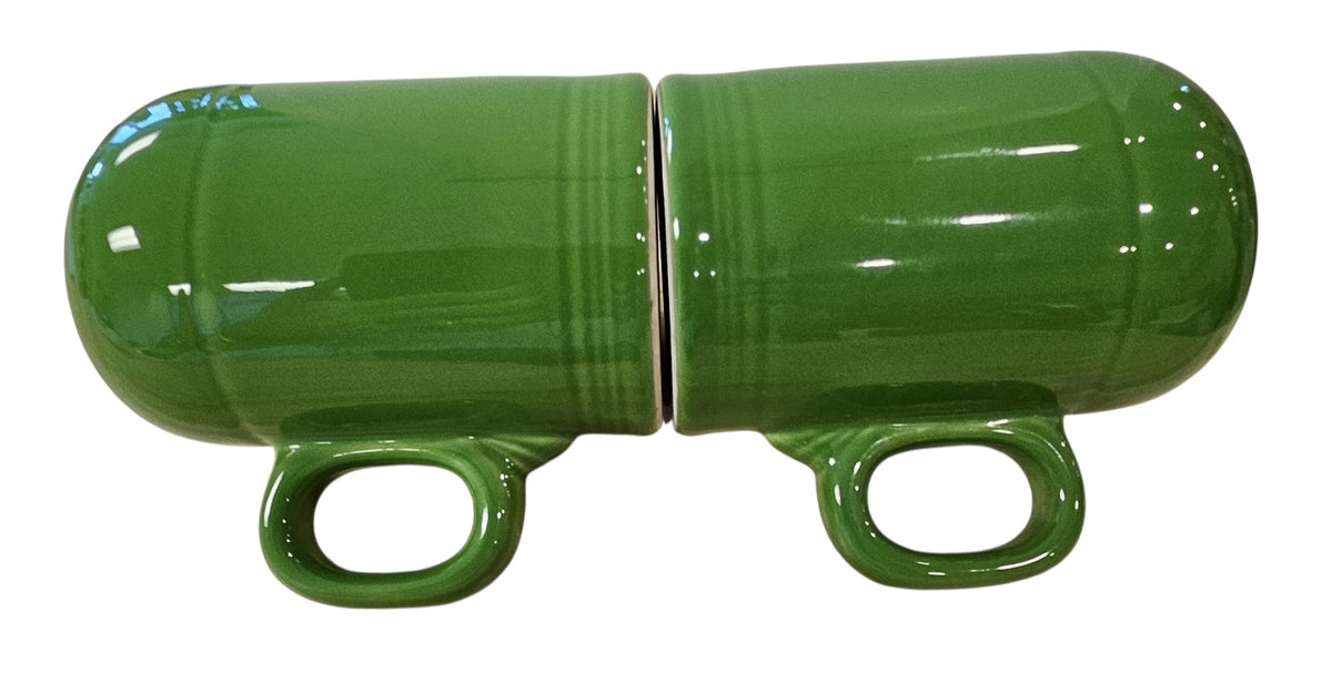 This is a Fiesta Fiestaware set of Range top Rangetop Salt and Pepper Shakers in shamrock. Post 1986 Retired Color Retired Shape Stove top Lead Free
