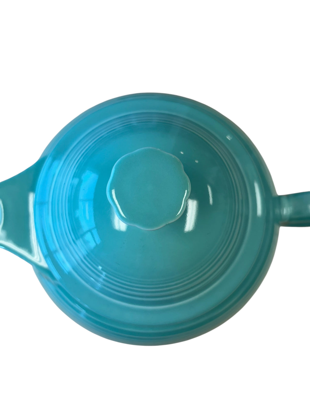 This is a Fiesta Fiestaware Five-cup 5-cup Ring Handled Tea Pot with Lid in Sea Mist Green. lead-free, Post 1986, Retired Color Retired Shape
