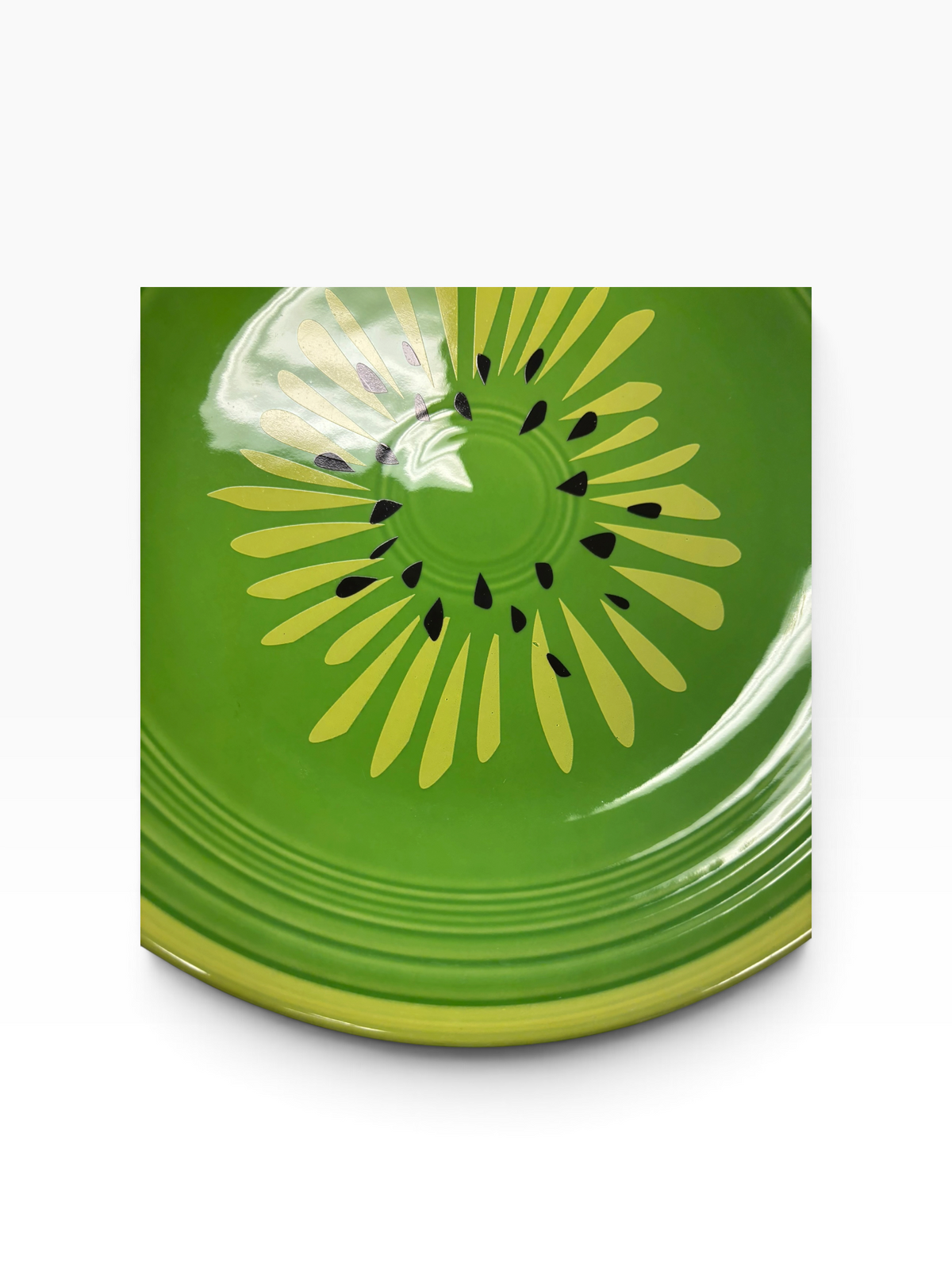 This is Fiesta fiestware Classic Dinner Plate featuring the Betty Crocker Kiwi decal on shamrock. Lead free, post 1986, retired color, retired decal, Hard to Find
