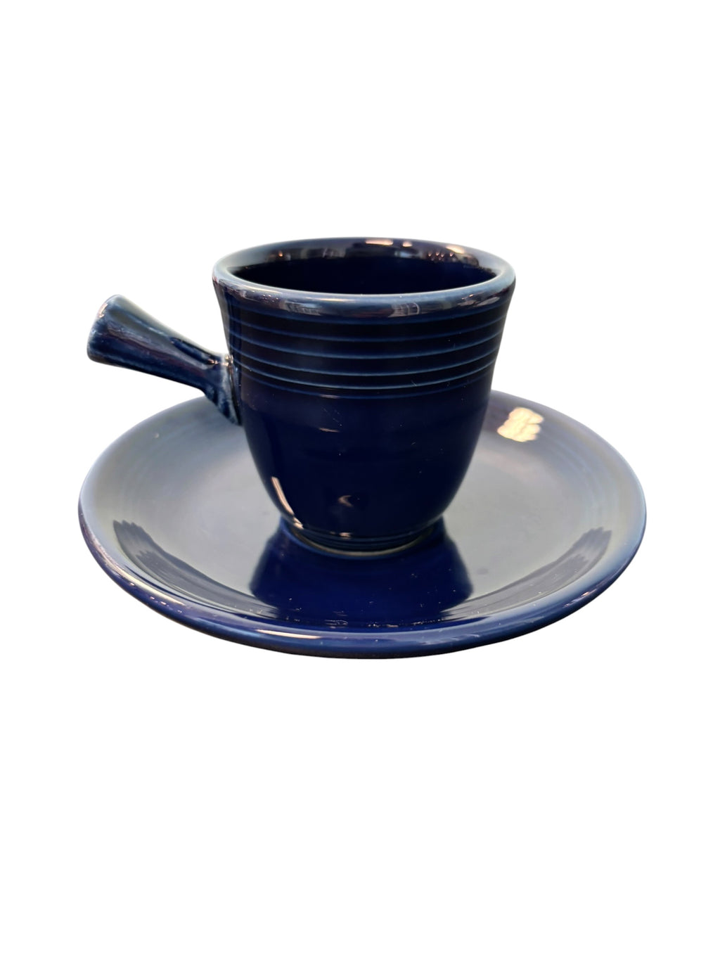 This is a Fiesta Fiestaware After Dinner AD Stick Handled Demitasse Demi Cup and Saucer Set in Cobalt. lead-free, Post 1986, Retired Color Retired Shape Perfect for Espresso

