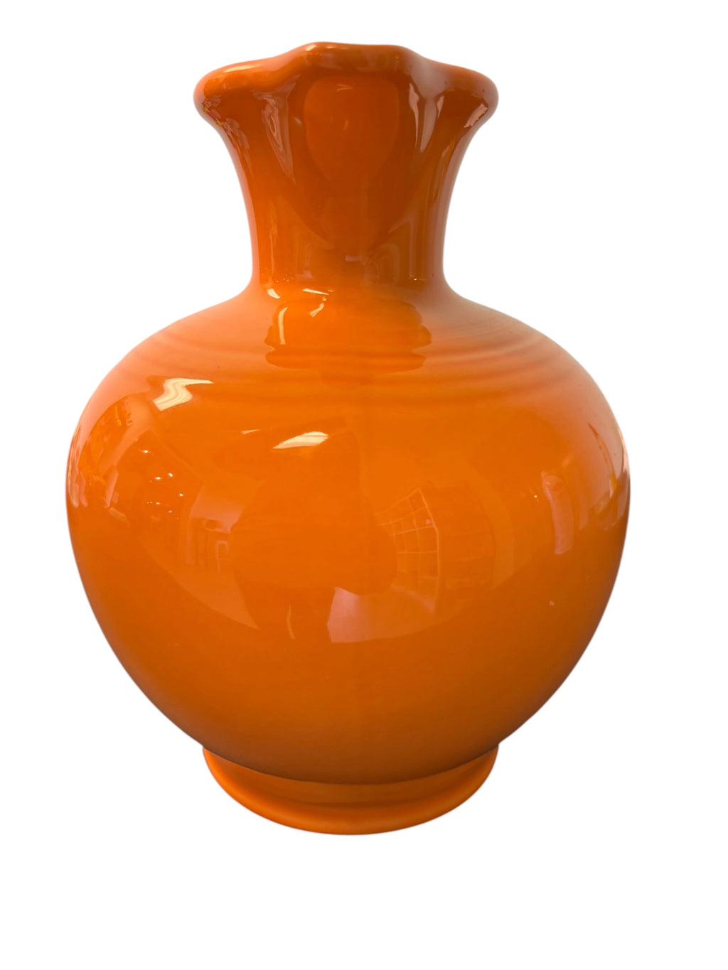 This is a Fiesta Fiestware small 60 Ounce Carafe in tangerine. Lead-free Post 1986 Retired color retired shape
