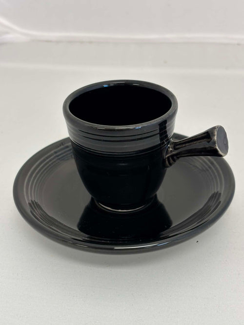 This is a Fiesta Fiestaware After Dinner AD Stick Handled Demitasse Demi Cup and Saucer Set in Black. lead-free, Post 1986, Retired Color Retired Shape Perfect for Espresso
