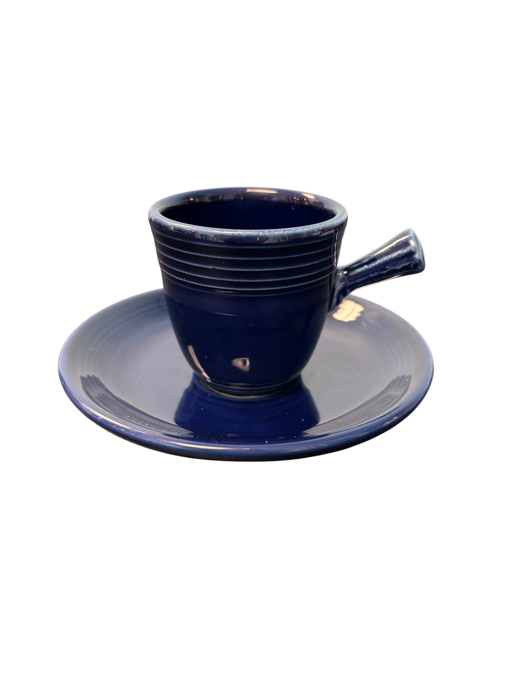 This is a Fiesta Fiestaware After Dinner AD Stick Handled Demitasse Demi Cup and Saucer Set in Cobalt. lead-free, Post 1986, Retired Color Retired Shape Perfect for Espresso
