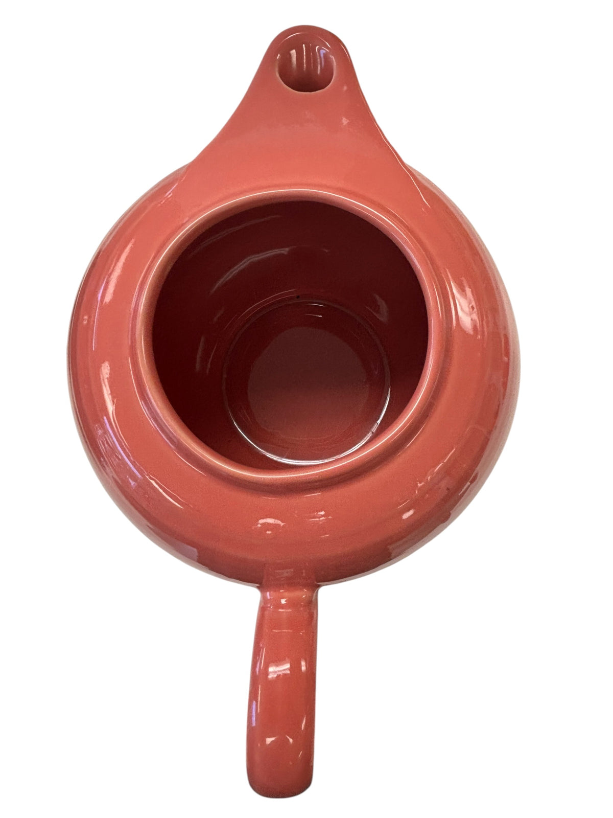 This is a Fiesta Fiestaware Five-cup 5-cup Ring Handled Tea Pot with Lid in Flamingo. lead-free, Post 1986, Retired Color Retired Shape
