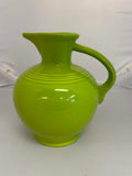 This is a Fiesta Fiestware small 60 Ounce Carafe in chartreuse. Lead-free Post 1986 Retired color retired shape
