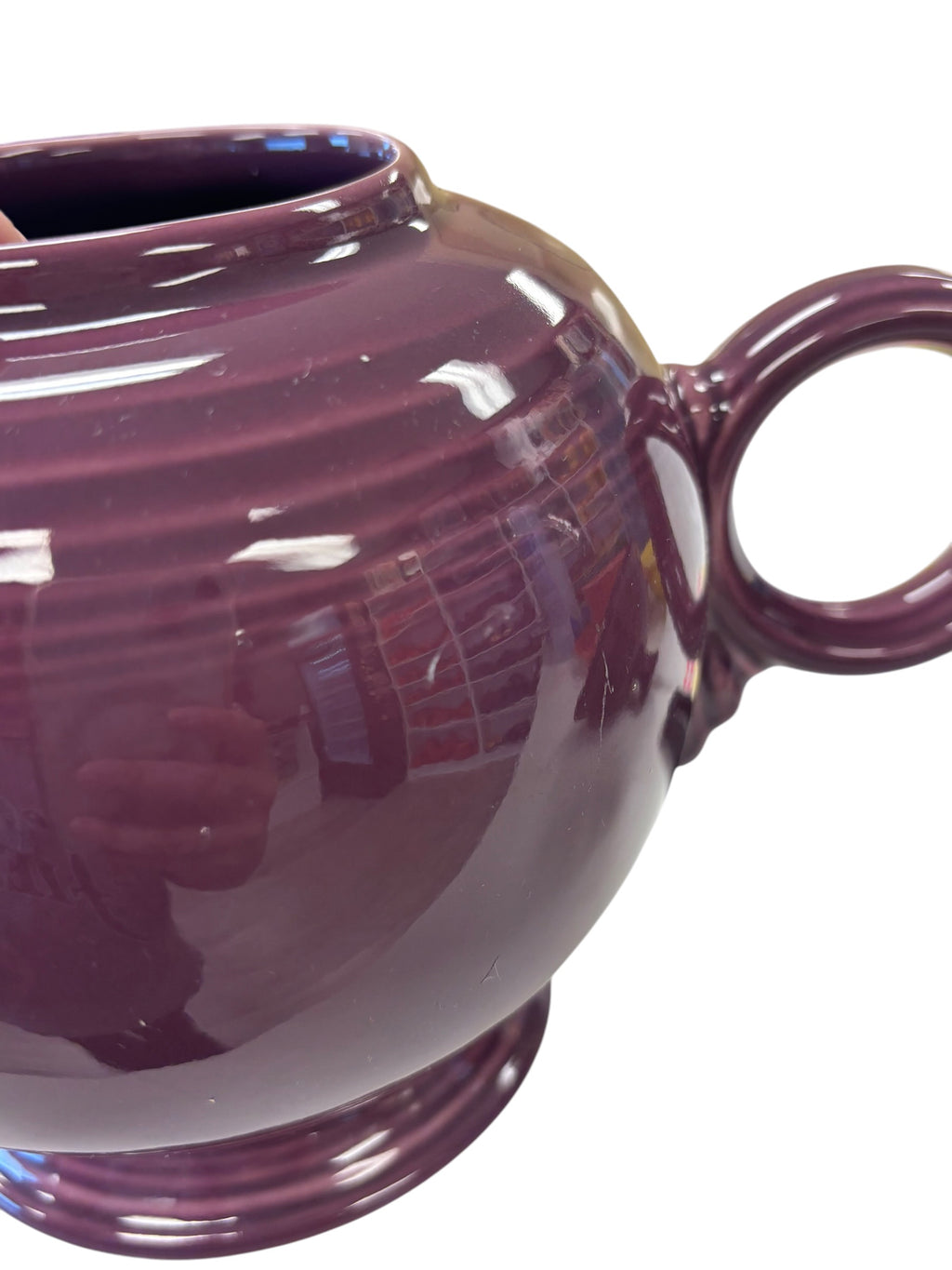 This is a Fiesta Fiestaware Five-cup 5-cup Ring Handled Tea Pot with Lid in Heather. lead-free, Post 1986, Retired Color Retired Shape
