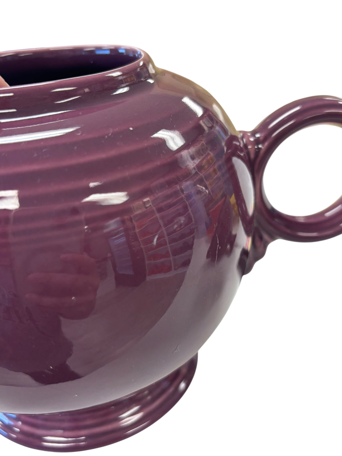 This is a Fiesta Fiestaware Five-cup 5-cup Ring Handled Tea Pot with Lid in Heather. lead-free, Post 1986, Retired Color Retired Shape
