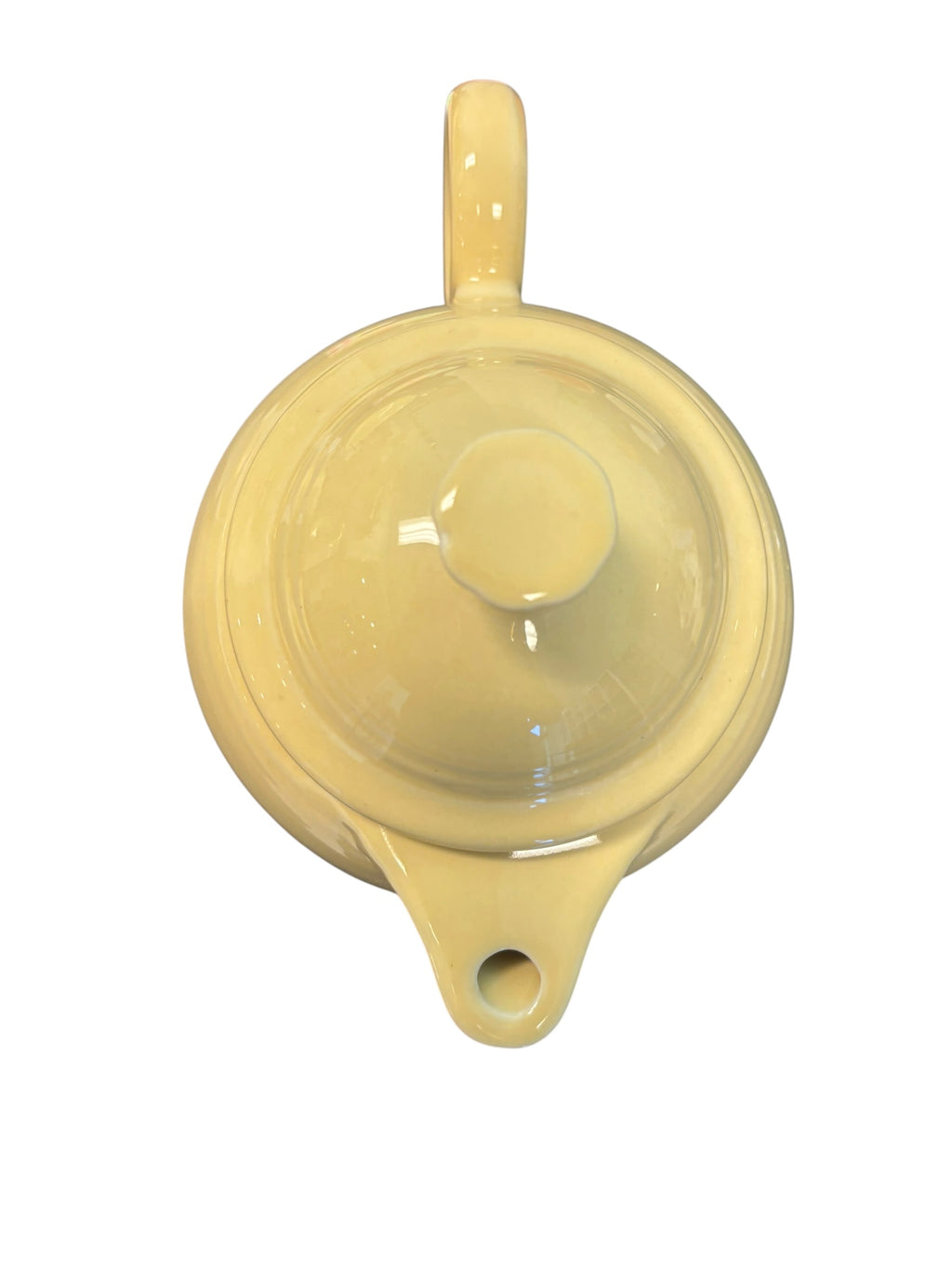 This is a Fiesta Fiestaware Five-cup 5-cup Ring Handled Tea Pot with Lid in Ivory. lead-free, Post 1986, Retired Color Retired Shape
