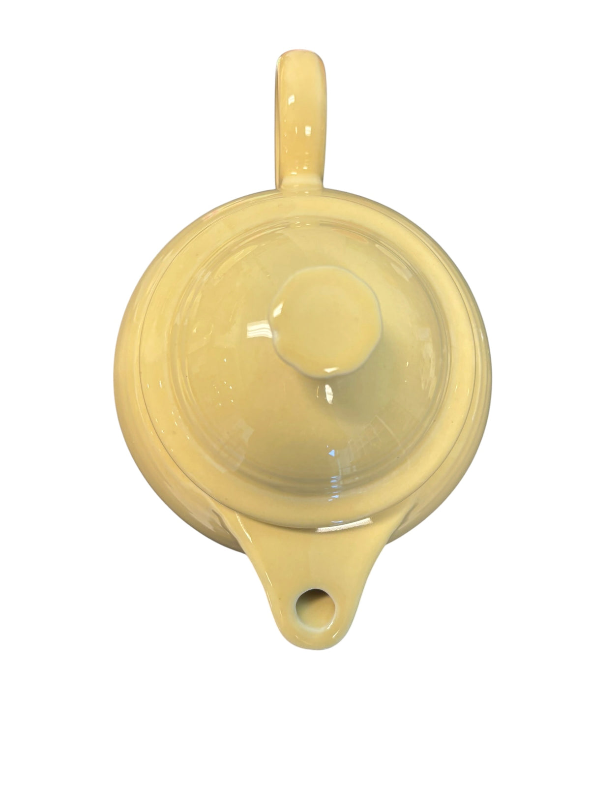 This is a Fiesta Fiestaware Five-cup 5-cup Ring Handled Tea Pot with Lid in Ivory. lead-free, Post 1986, Retired Color Retired Shape
