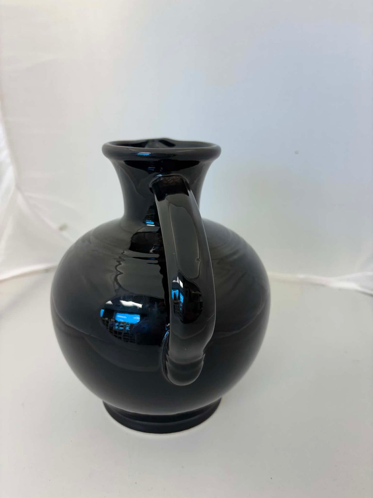 This is a Fiesta Fiestware small 60 Ounce Carafe in black. Lead-free Post 1986 Retired color retired shape

