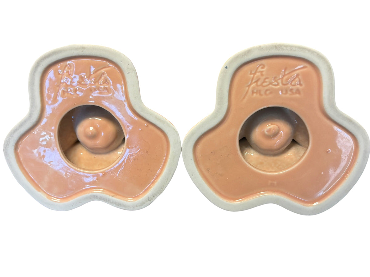 This is a Fiesta Fiestaware retired pyramid candle holder pair in Apricot. Lead-free Post 1986 Retired Color Retired Shape