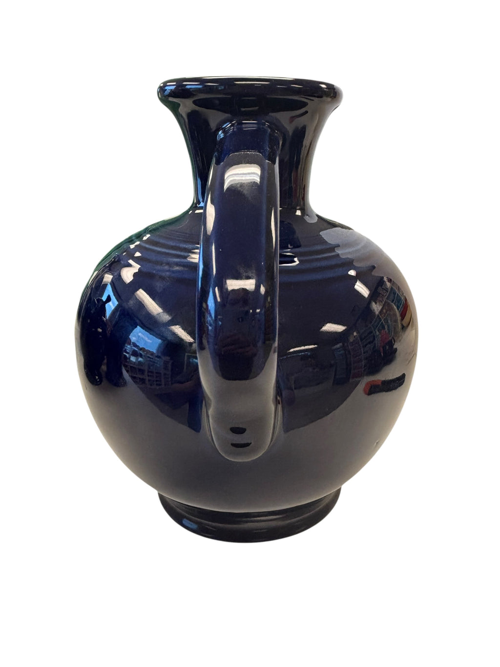 This is a Fiesta Fiestware small 60 Ounce Carafe in cobalt. Lead-free Post 1986 Retired color retired shape
