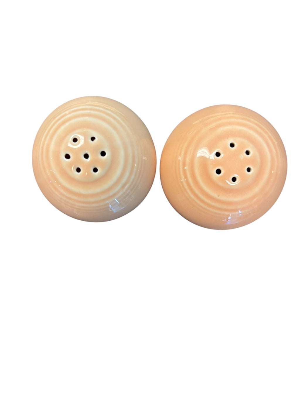 This is a Fiesta Fiestaware Bulb Shaped Salt and Pepper Shaker Set in Apricot. lead-free, Post 1986, Retired Color 