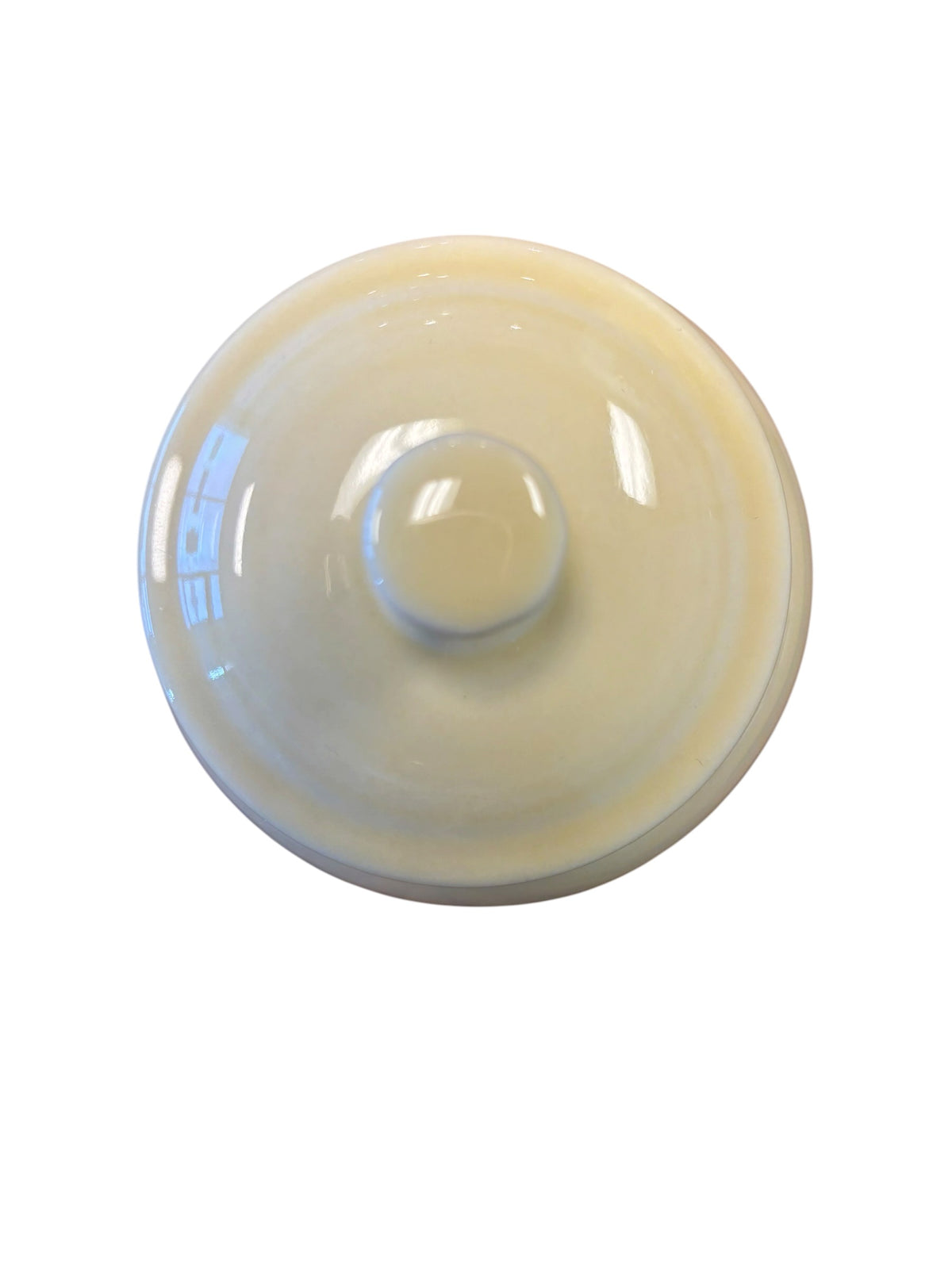 This is a Fiesta Fiestaware Individual Sugar Bowl With Lid in Ivory. lead-free, Post 1986, Retired Color Retired Shape

