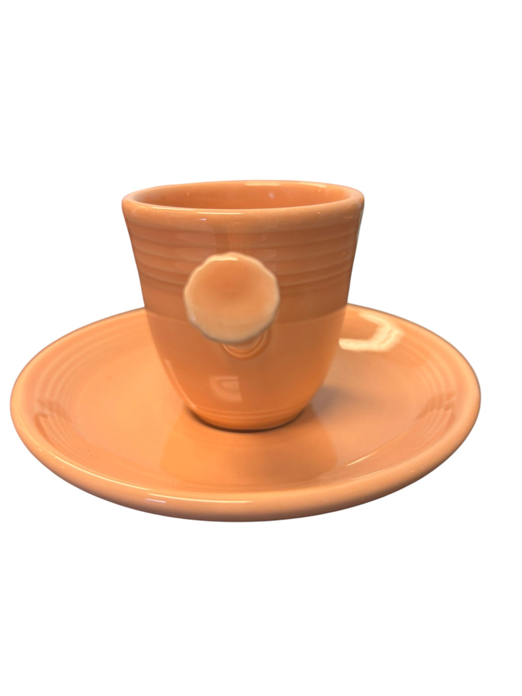 This is a Fiesta Fiestaware After Dinner AD Stick Handled Demitasse Demi Cup and Saucer Set in Apricot. lead-free, Post 1986, Retired Color Retired Shape Perfect for Espresso