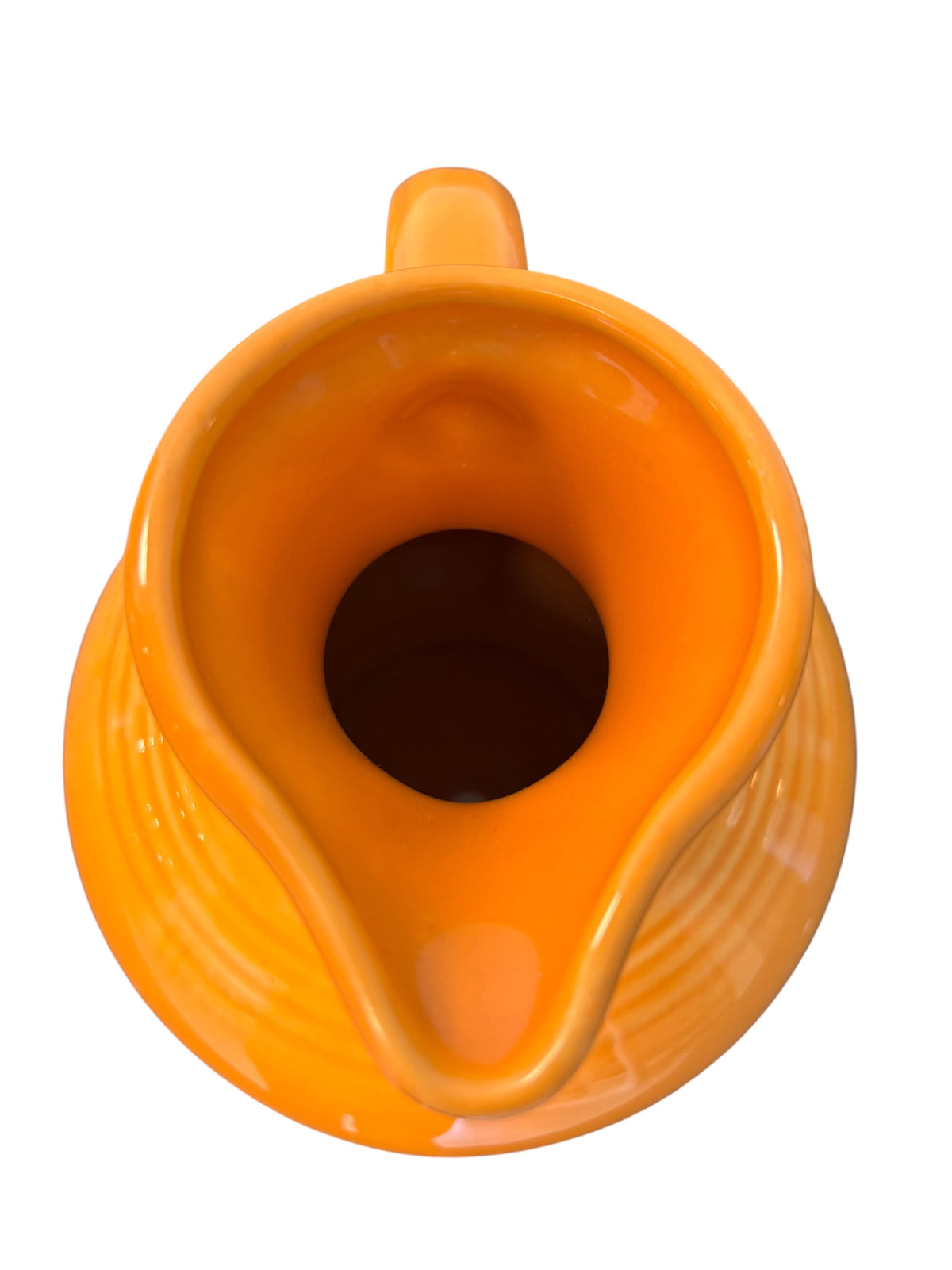 This is a Fiesta Fiestware small 60 Ounce Carafe in tangerine. Lead-free Post 1986 Retired color retired shape
