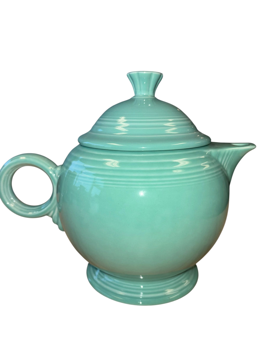 This is a Fiesta Fiestaware Five-cup 5-cup Ring Handled Tea Pot with Lid in Sea Mist Green. lead-free, Post 1986, Retired Color Retired Shape
