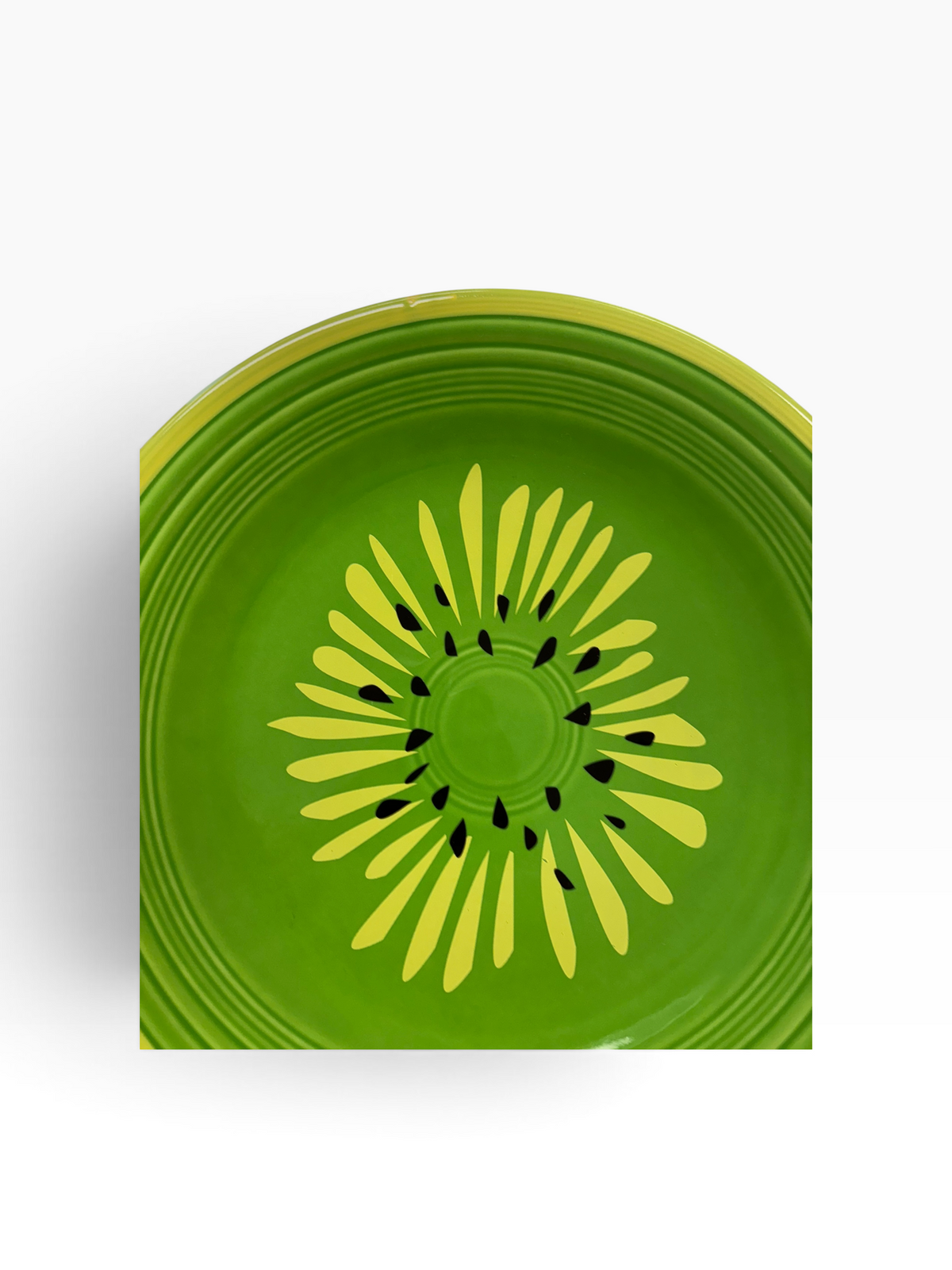 This is Fiesta fiestware Classic Dinner Plate featuring the Betty Crocker Kiwi decal on shamrock. Lead free, post 1986, retired color, retired decal, Hard to Find
