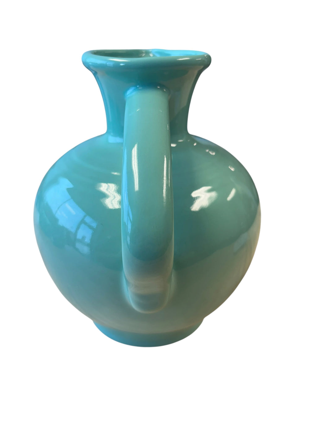 This is a Fiesta Fiestware small 60 Ounce Carafe in sea mist green. Lead-free Post 1986 Retired color retired shape
