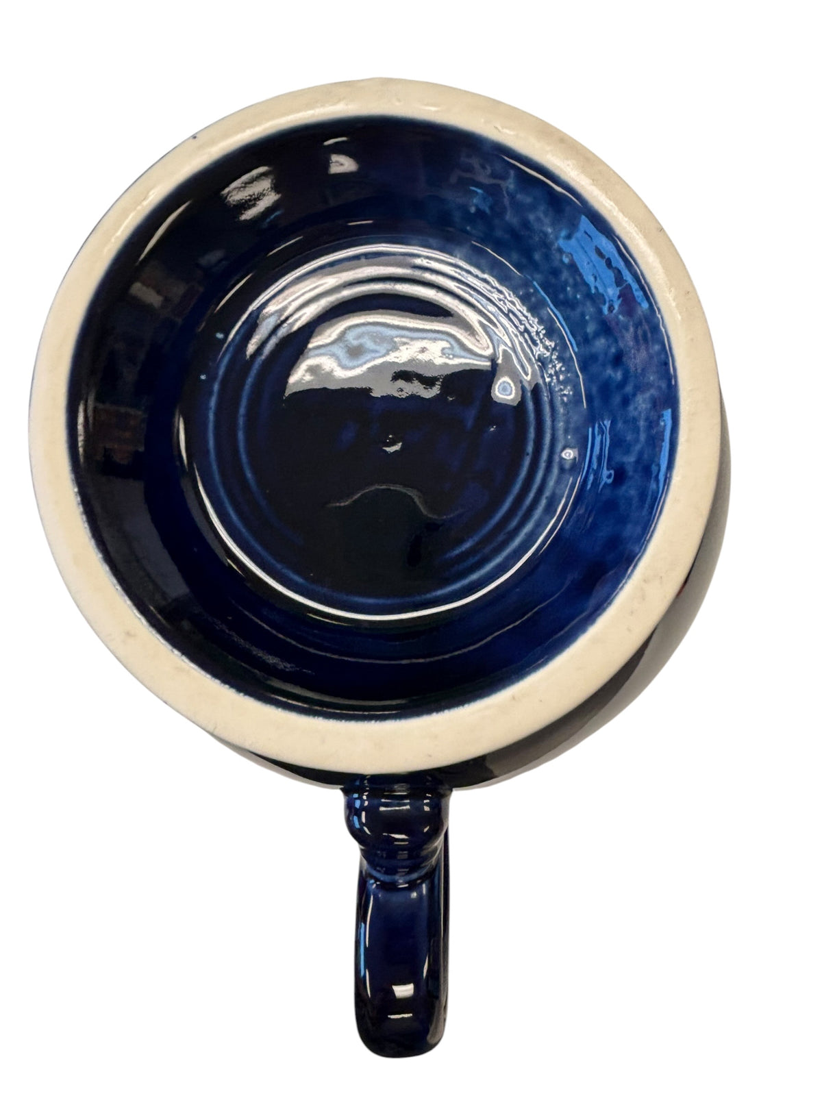 This is a Fiesta Fiestaware Five-cup 5-cup Ring Handled Tea Pot with Lid in Cobalt. lead-free, Post 1986, Retired Color Retired Shape
