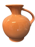 This is a Fiesta Fiestware small 60 Ounce Carafe in apricot. Lead-free Post 1986 Retired color retired shape