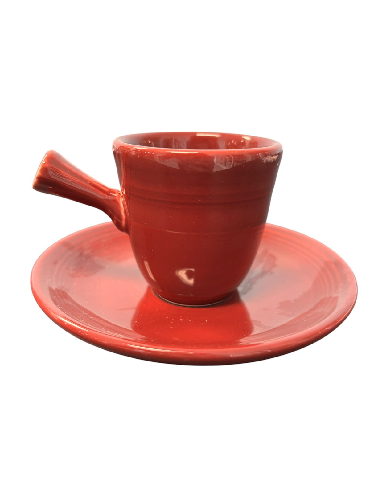 This is a Fiesta Fiestaware After Dinner AD Stick Handled Demitasse Demi Cup and Saucer Set in Cinnabar. lead-free, Post 1986, Retired Color Retired Shape Perfect for Espresso
