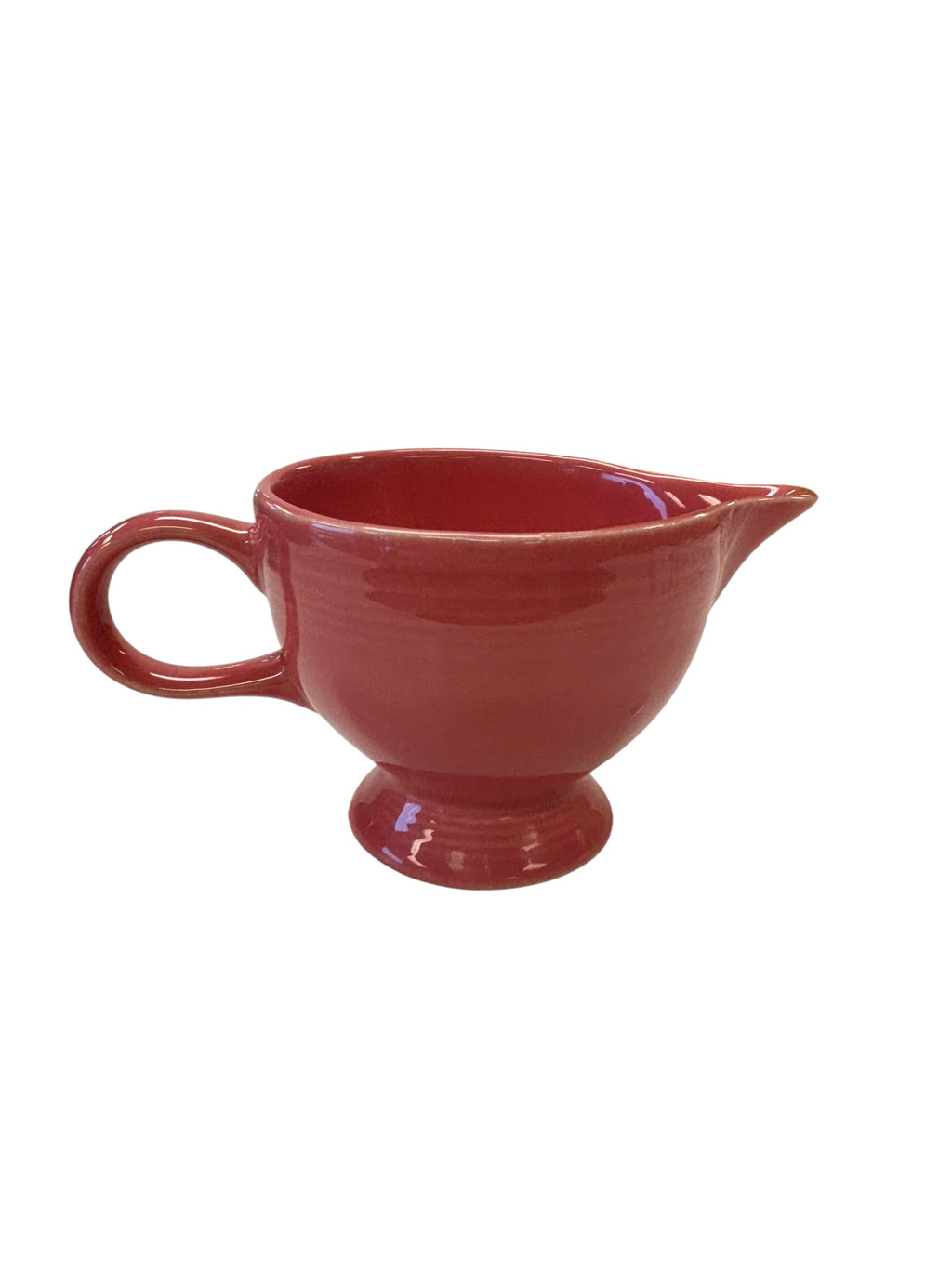 This is a Fiesta Fiestaware individual cream pitcher creamer in Flamingo. lead-free, Post 1986, Retired Color Retired Shape
