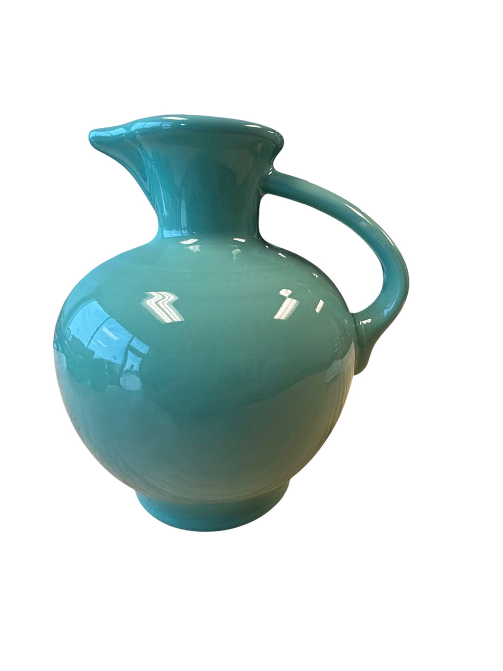 This is a Fiesta Fiestware small 60 Ounce Carafe in sea mist green. Lead-free Post 1986 Retired color retired shape
