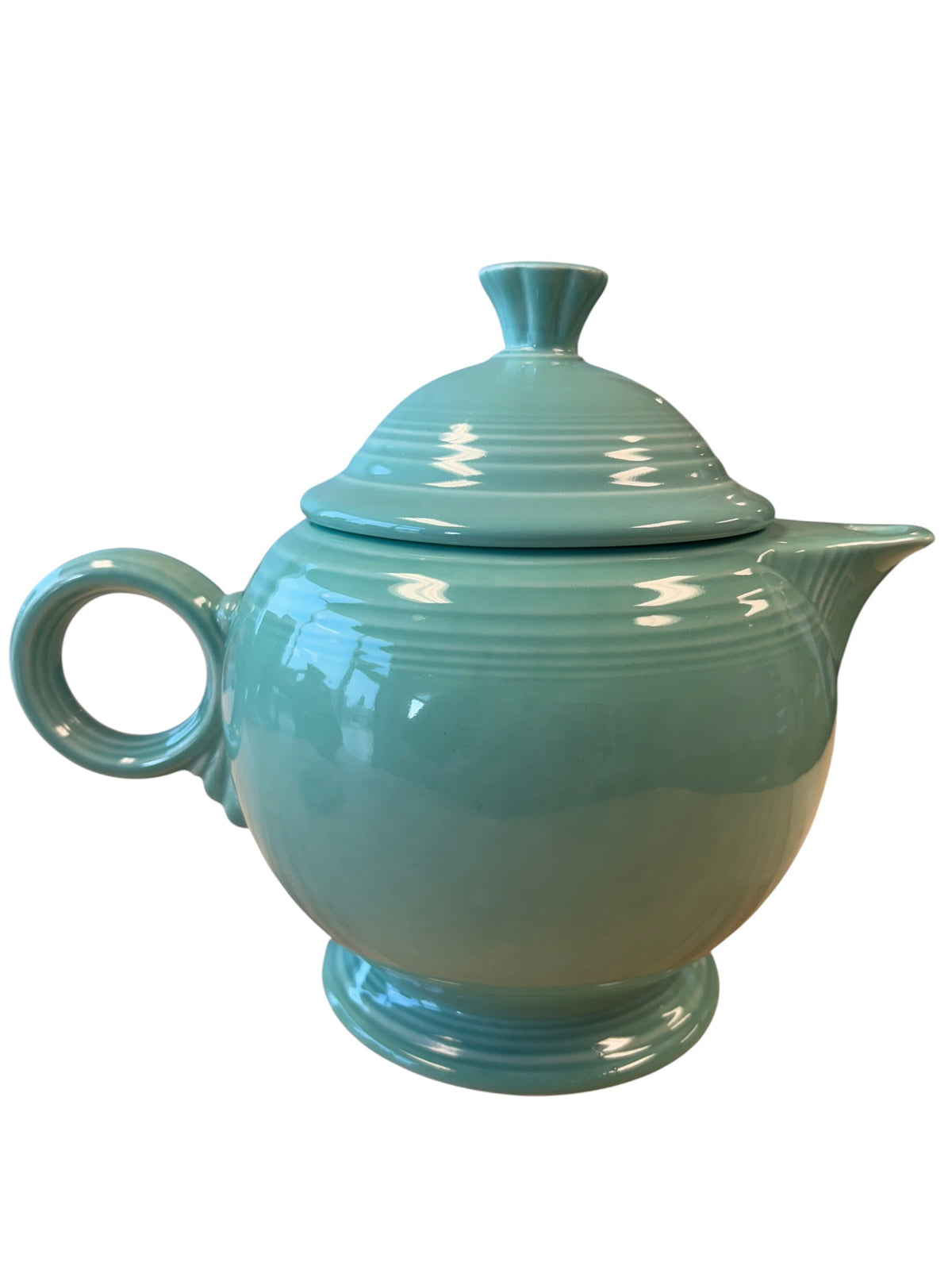 This is a Fiesta Fiestaware Five-cup 5-cup Ring Handled Tea Pot with Lid in Sea Mist Green. lead-free, Post 1986, Retired Color Retired Shape
