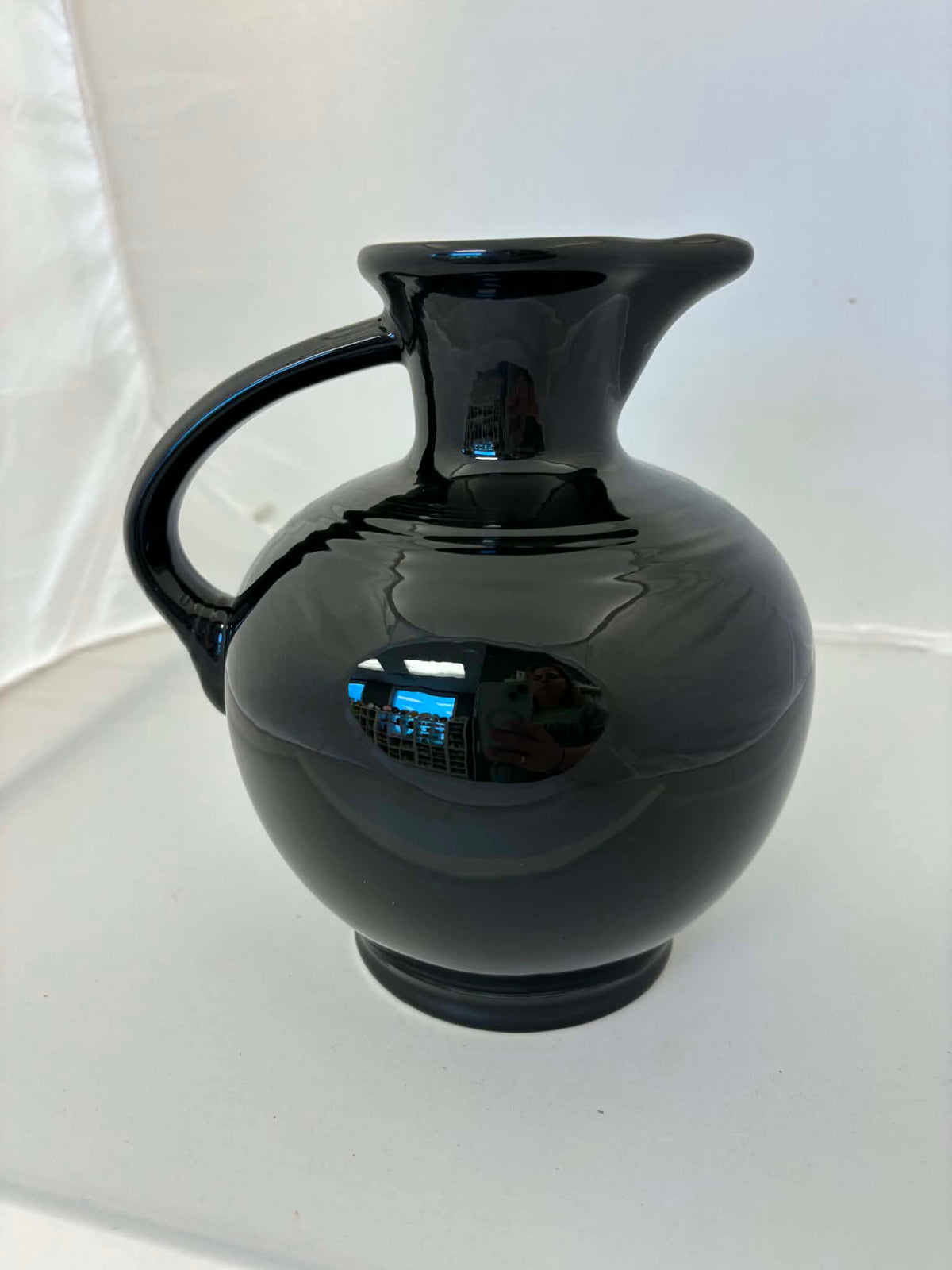 This is a Fiesta Fiestware small 60 Ounce Carafe in black. Lead-free Post 1986 Retired color retired shape
