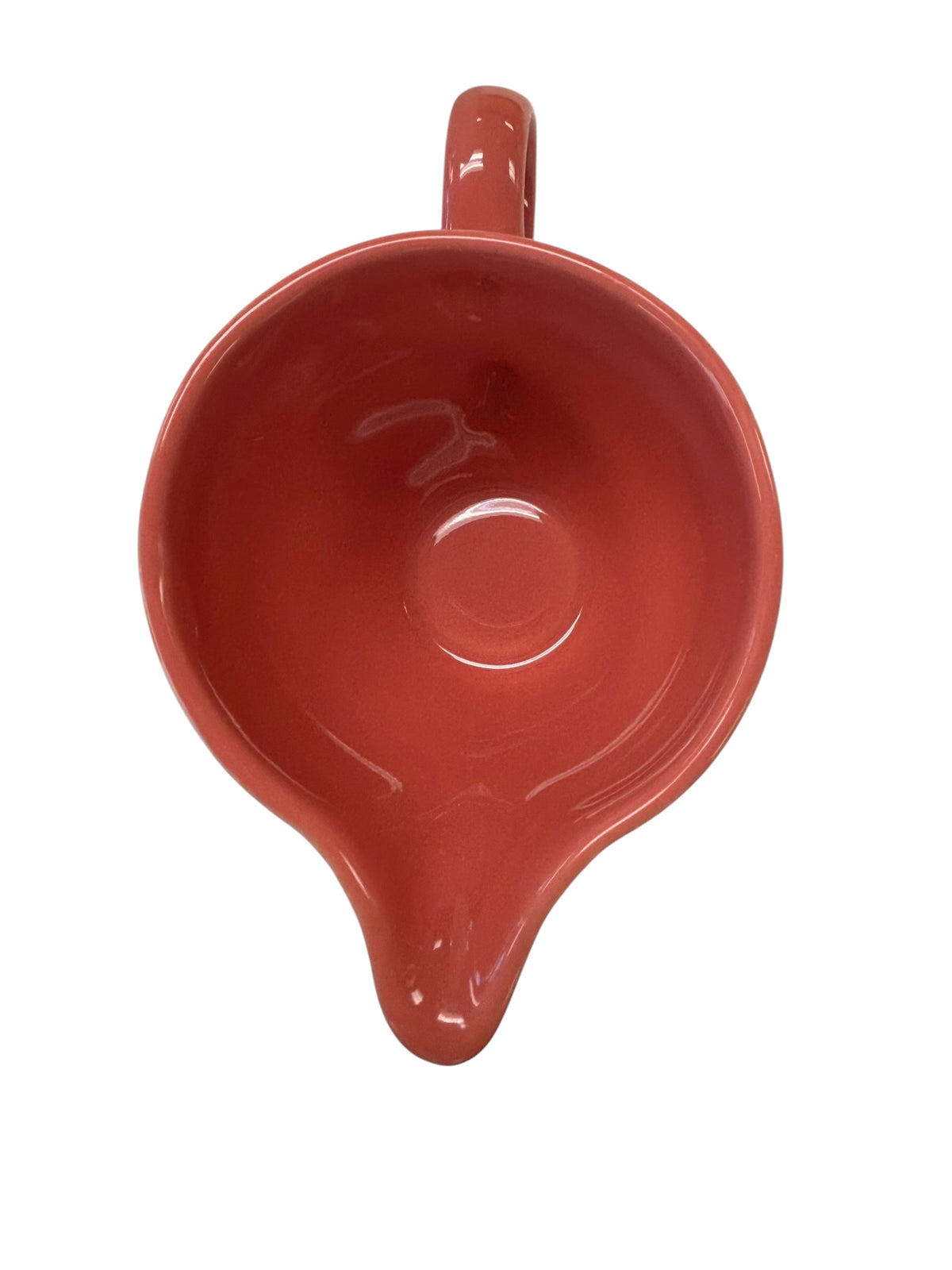 This is a Fiesta Fiestaware individual cream pitcher creamer in Flamingo. lead-free, Post 1986, Retired Color Retired Shape
