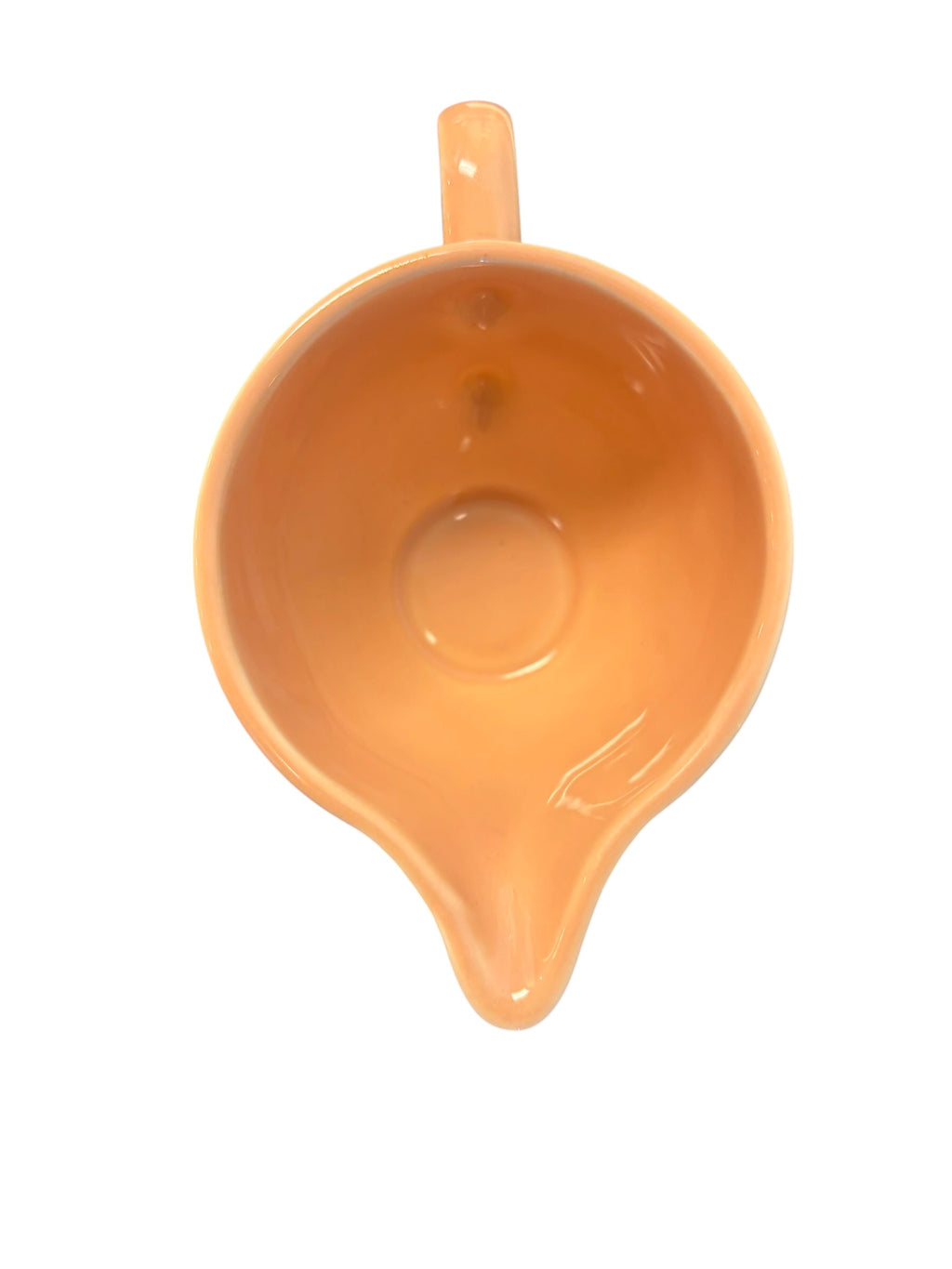 This is a Fiesta Fiestaware individual cream pitcher creamer in Apricot. lead-free, Post 1986, Retired Color Retired Shape
