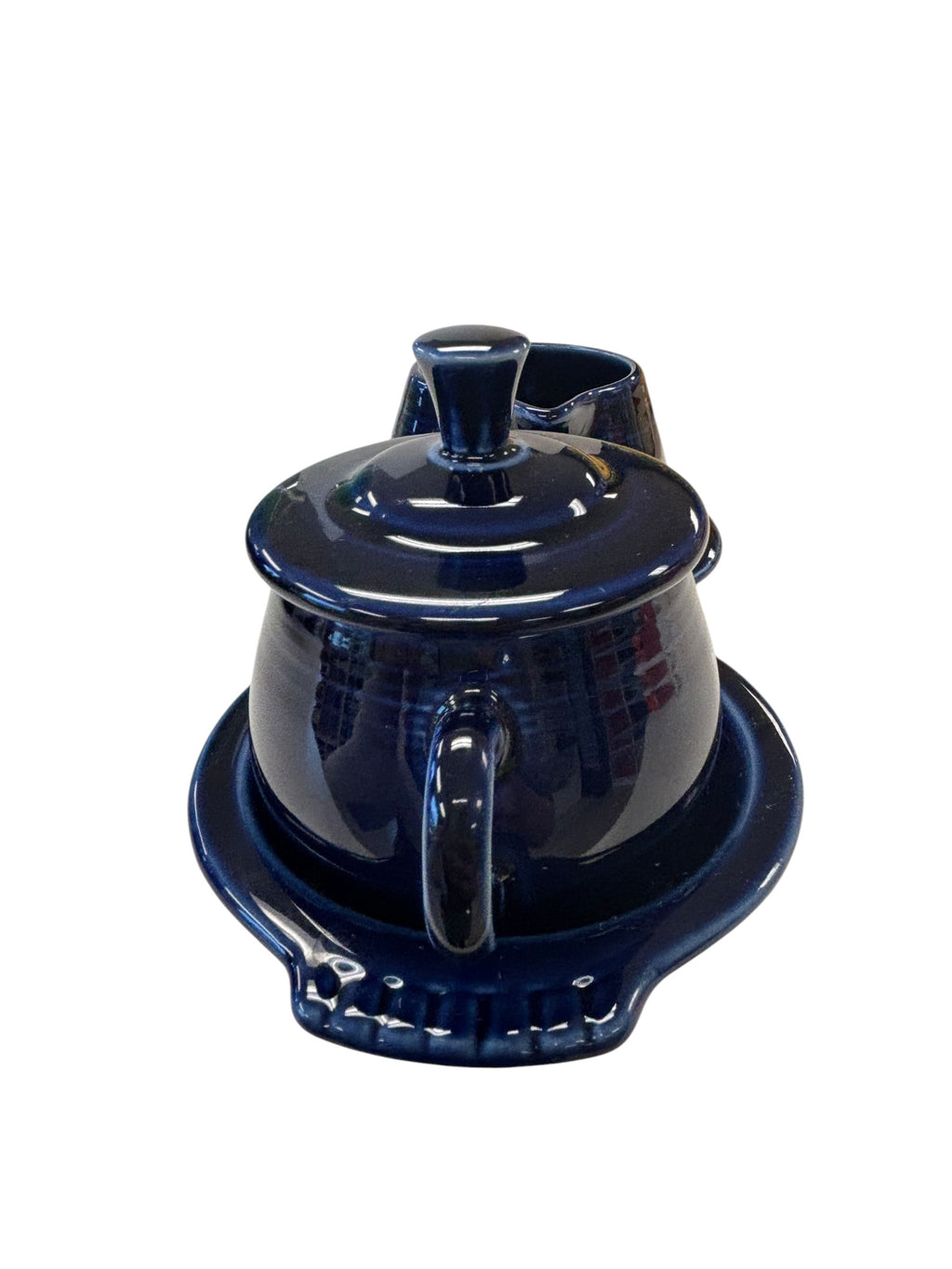 This is a Fiesta Fiestaware Creamer Pitcher Sugar Bowl with Lid on Figure Eight 8 Tray Set in cobalt lead-free, Post 1986, Retired Color Retired Shape
