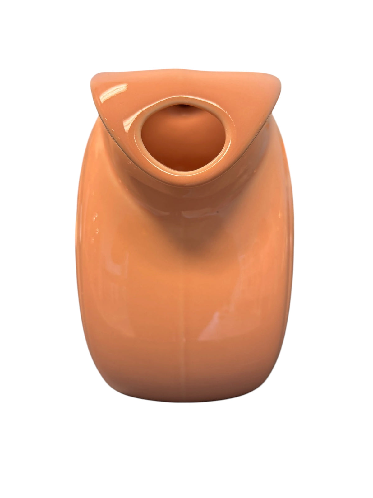This is a Fiesta Fiestaware Large Disc Water Pitcher in Apricot. lead-free, Post 1986, Retired Color Retired Shape 67 ounce capacity