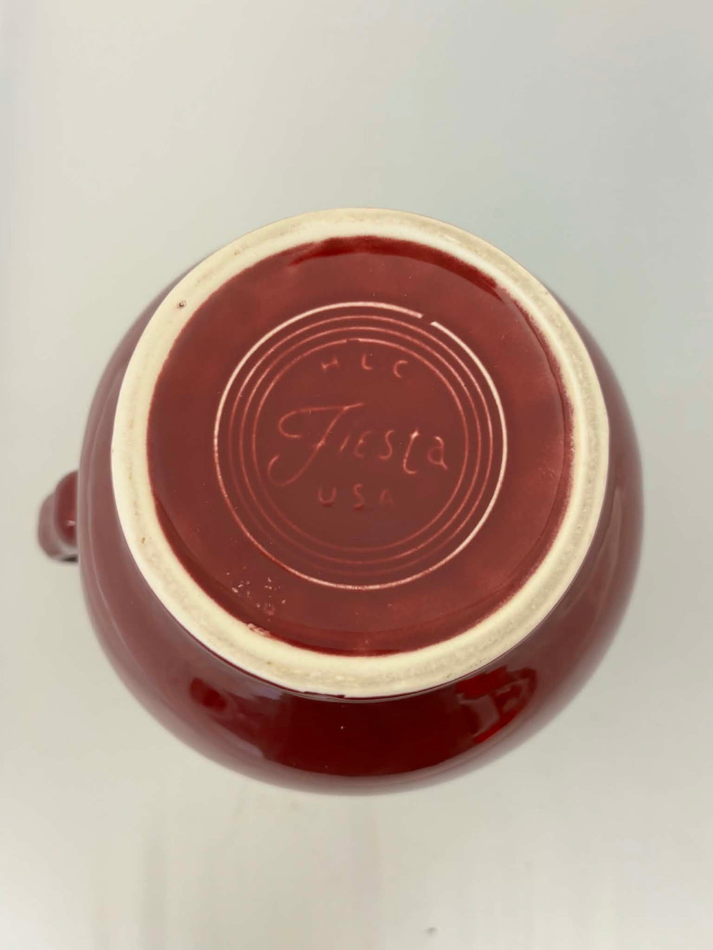 This is a Fiesta Fiestware small 60 Ounce Carafe in cinnabar. Lead-free Post 1986 Retired color retired shape
