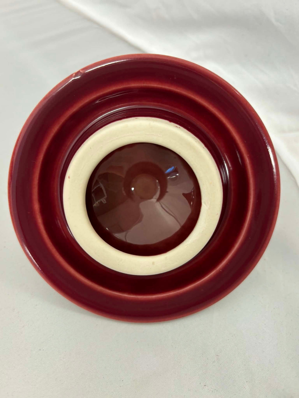 This is a Fiesta Fiestaware Five-cup 5-cup Ring Handled Tea Pot with Lid in Cinnabar. lead-free, Post 1986, Retired Color Retired Shape
