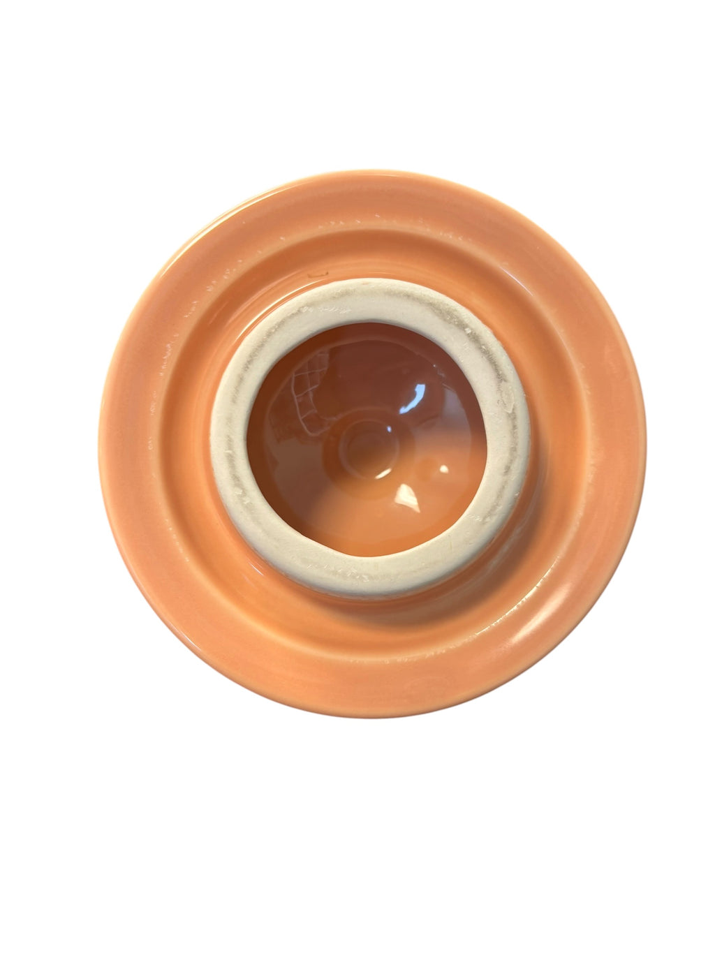 This is a Fiesta Fiestaware Five-cup 5-cup Ring Handled Tea Pot with Lid in Apricot. lead-free, Post 1986, Retired Color Retired Shape