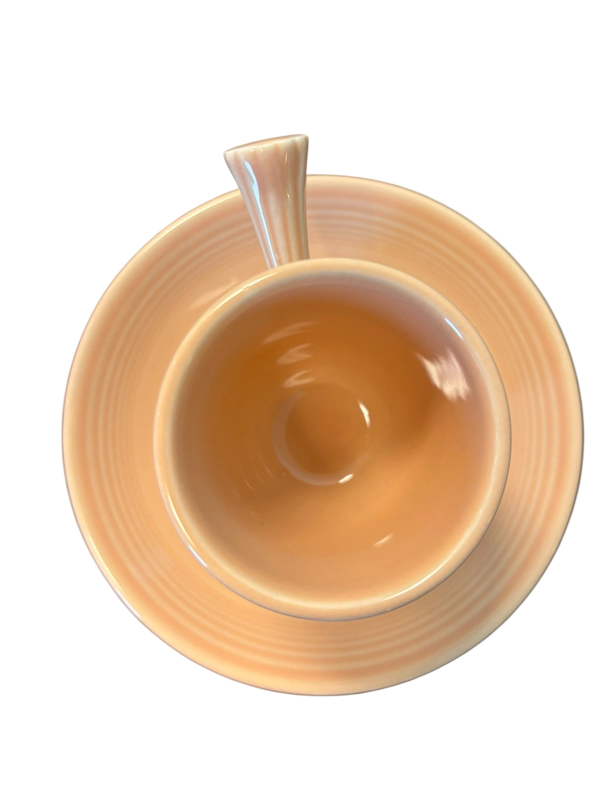 This is a Fiesta Fiestaware After Dinner AD Stick Handled Demitasse Demi Cup and Saucer Set in Apricot. lead-free, Post 1986, Retired Color Retired Shape Perfect for Espresso