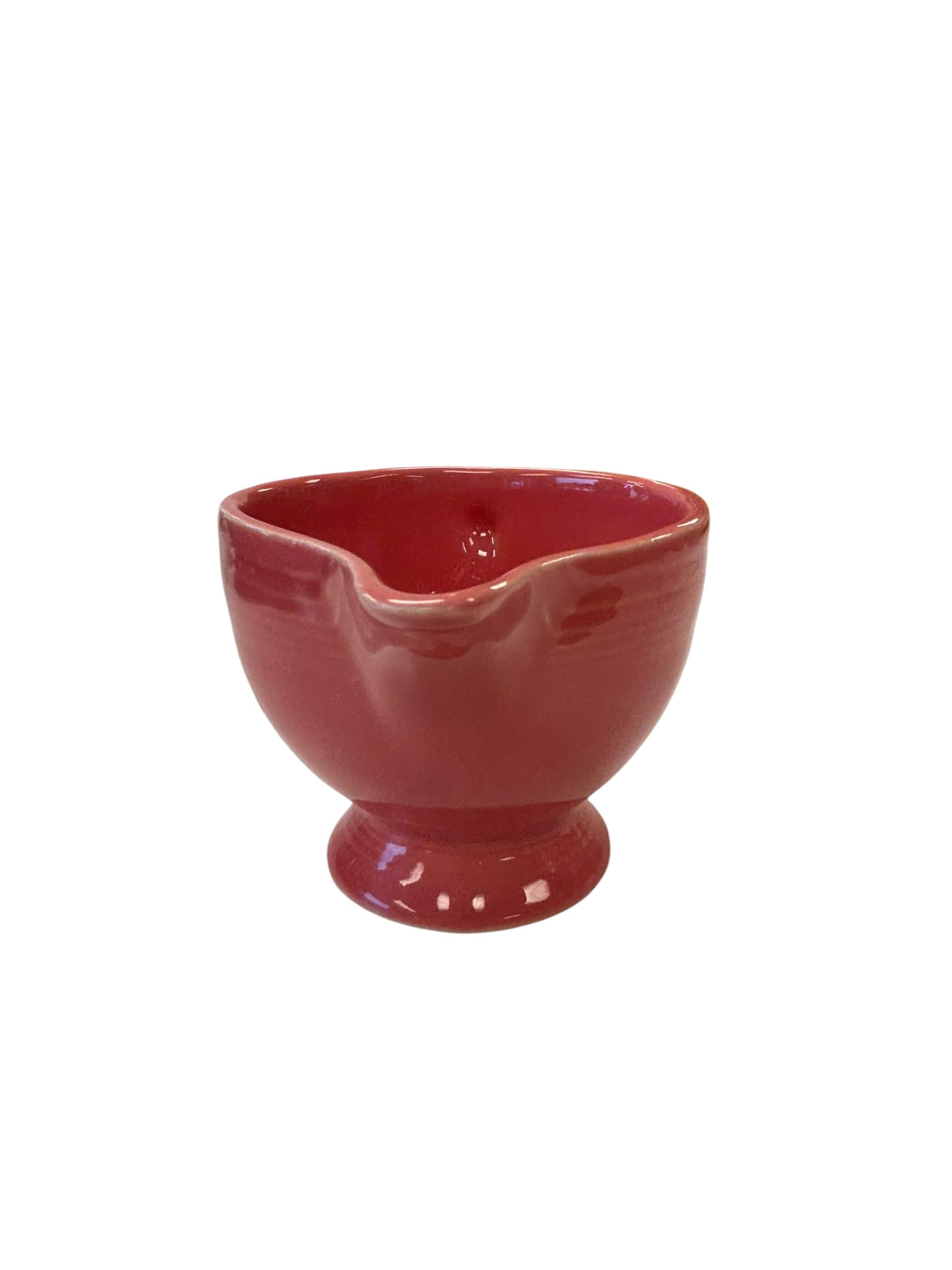 This is a Fiesta Fiestaware individual cream pitcher creamer in Flamingo. lead-free, Post 1986, Retired Color Retired Shape
